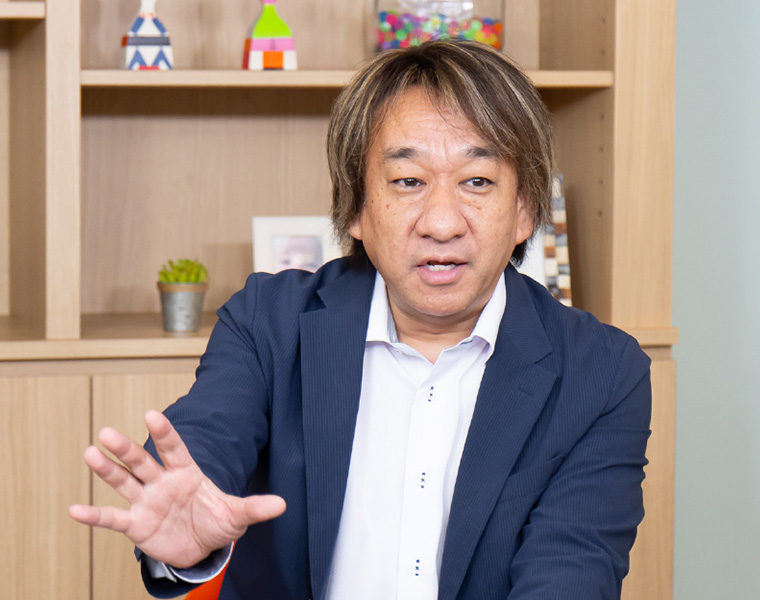 西脇 資哲 氏