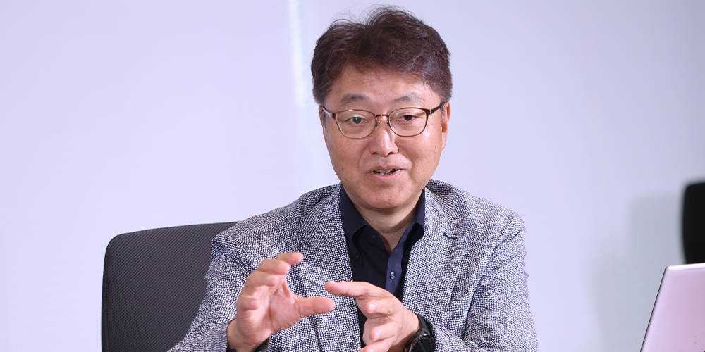 吉岡 智司氏