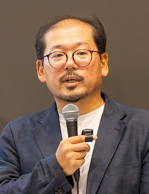 桜井 賢一 氏