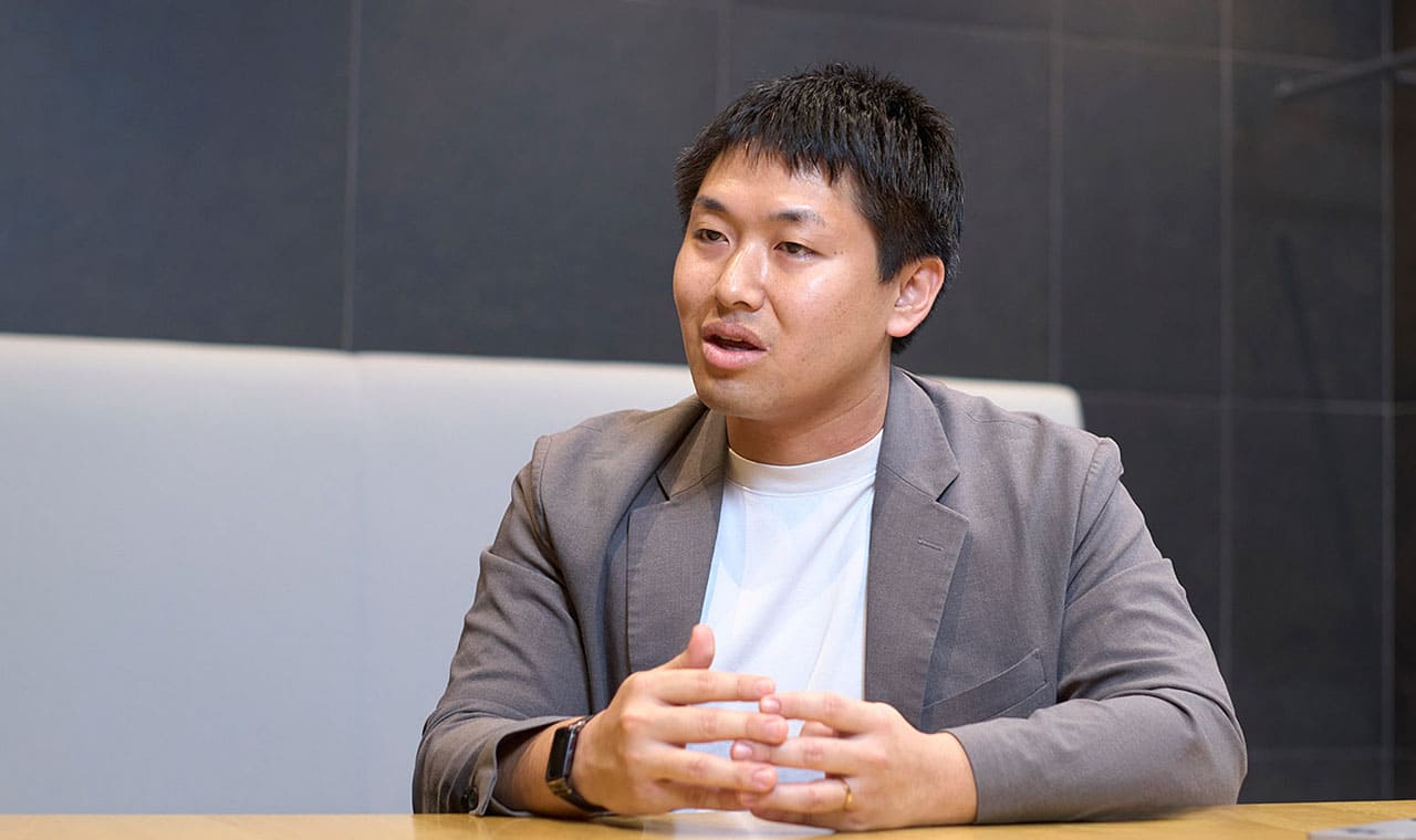 梅田 氏
