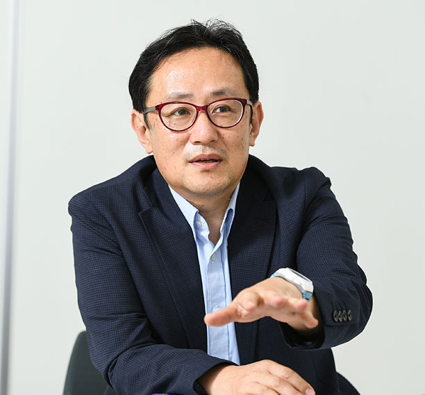 手塚 敦 氏