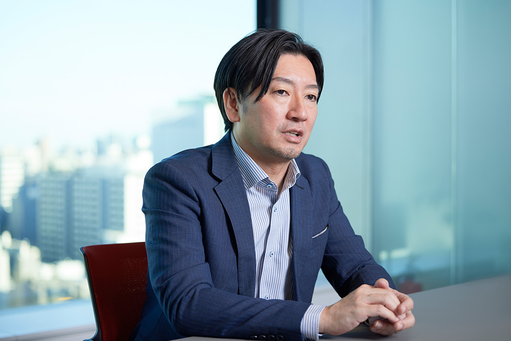執行 健司 氏