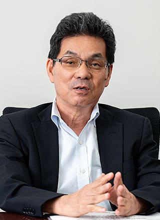 松塚氏
