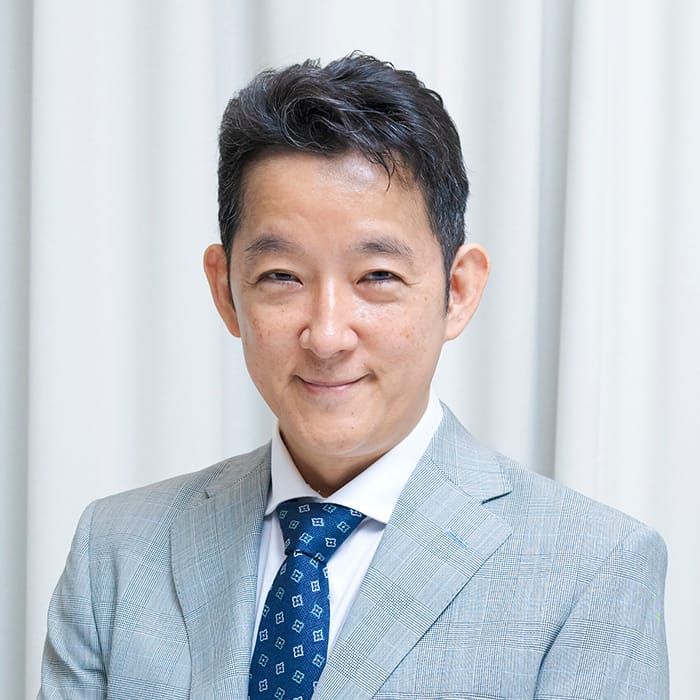 塚越 秀吉 氏