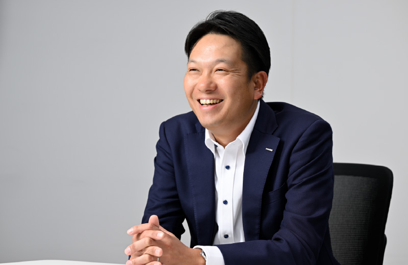 尾崎 伸弥 氏