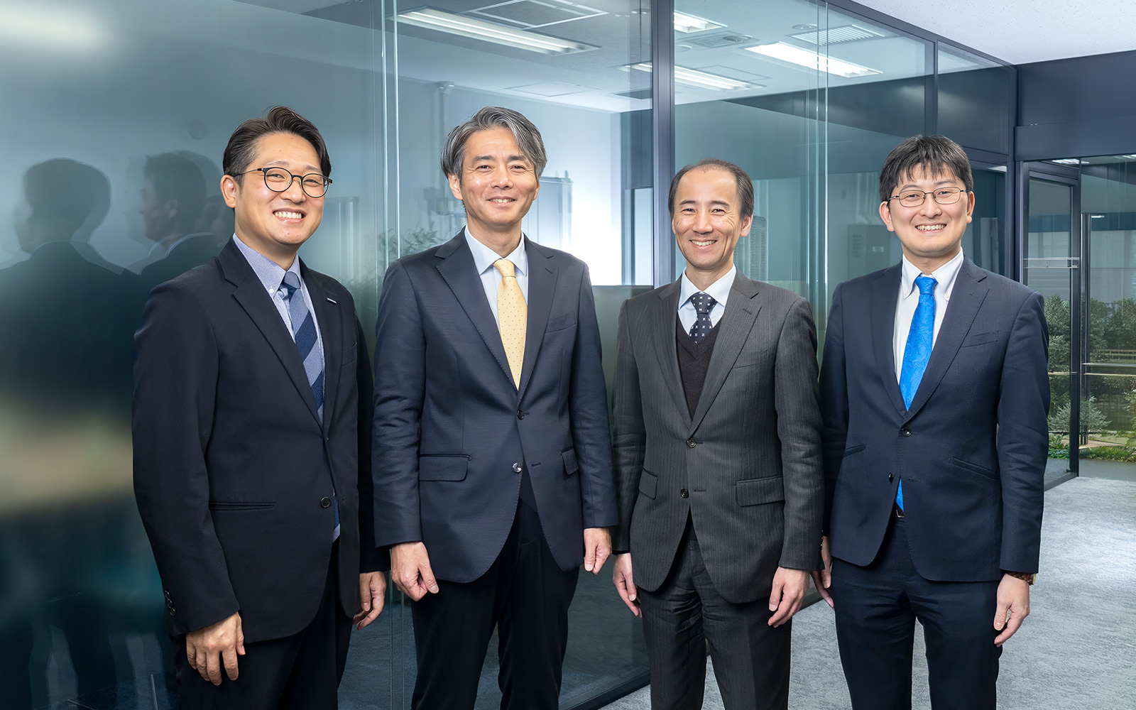 左より吉荒 靖高 氏、牛尾 剛 氏、大野 照男 氏、北島 洋平 氏