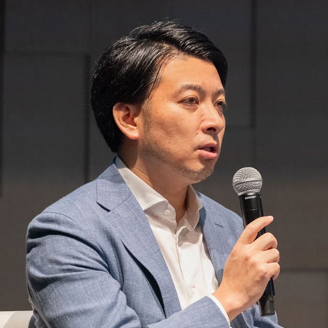 髙梨 氏